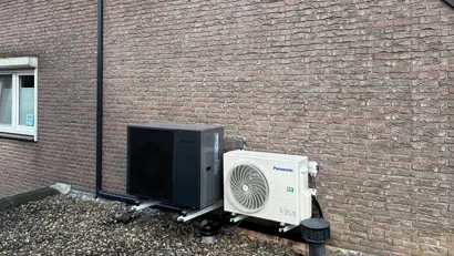 buitenunit-panasonic-airco-naast-warmtepomp.jpg` .jpg