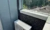 LG buitenunit op dakterras met strakke leidingafwerking – Tilburg.jpg