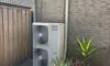 grote-buitenunit-airco-dubbele-ventilator-fietsenwinkel.jpg